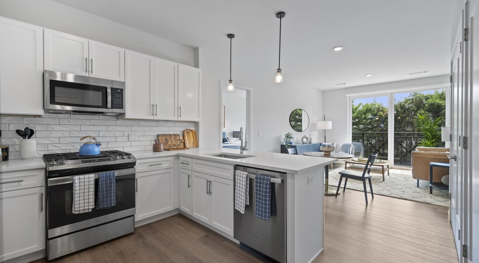 a kitchen with white cabinets