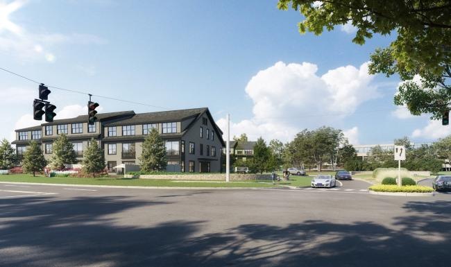 a street with cars and buildings
